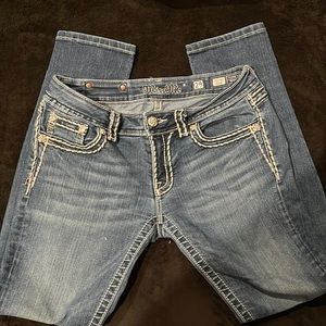 Miss Me jeans, skinny jeans, no holes,missing a stud on the rear brand patch.